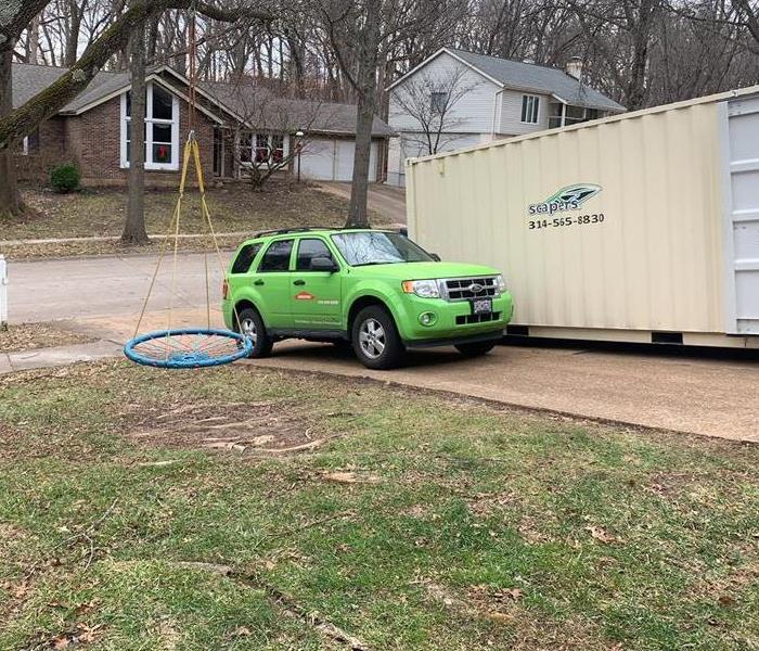 SERVPRO® vehicle in driveway